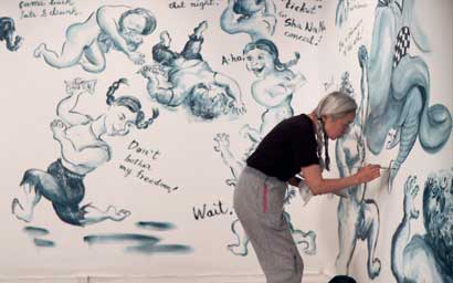 CUTIE_Noriko_Shinohara_painting Noriko Shinohara working on a painting. From Zachary Heinzerling’s CUTIE AND THE BOXER, a documentary about the 40-year marriage of artists Ushio and Noriko Shinohara. Photo credit: Zachary Heinzerling.