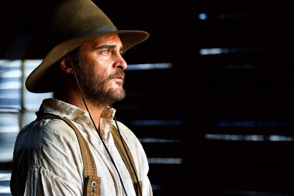 Joaquin Phoenix in una scena del film The Sister Brothers © Shanna Brsson Joaquin Phoenix in una scena del film The Sister Brothers - Photo credits Shanna Brsson